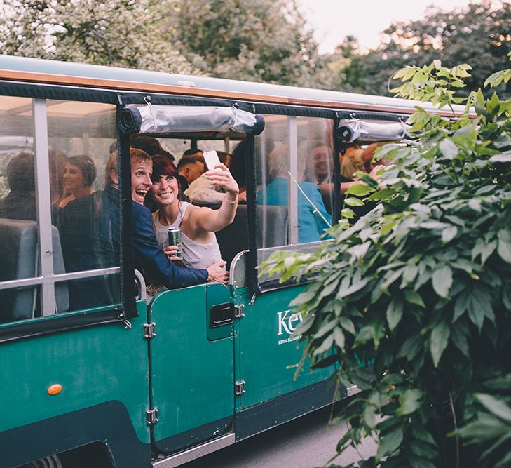 The Kew Explorer. A Quintessentially British Venue at Cambridge Cottage, Royal Botanic Gardens Kew. Bride Wears Paloma Blanca from Pure Couture Bridal and Groom Wears Tailored Suit from Hackett London.