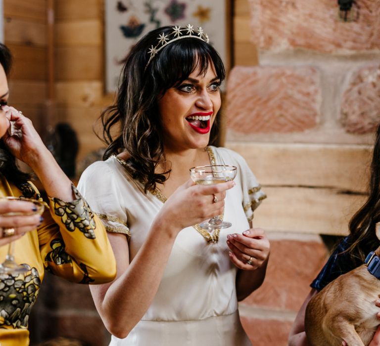 Bride in Vintage Wedding Dress Sipping Champagne