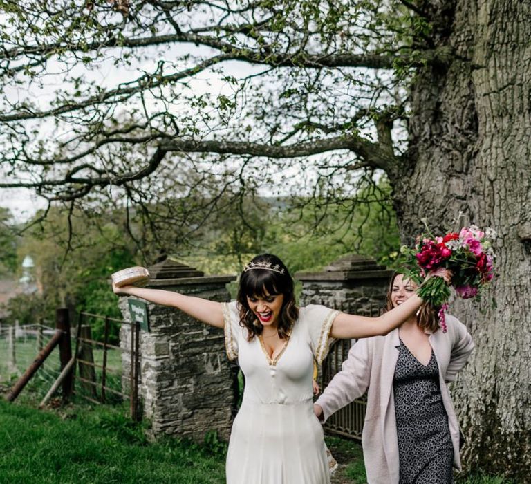 Happy Bride in Gold Sequin Edged Vintage Wedding Dress with Crown and Red Lipstick