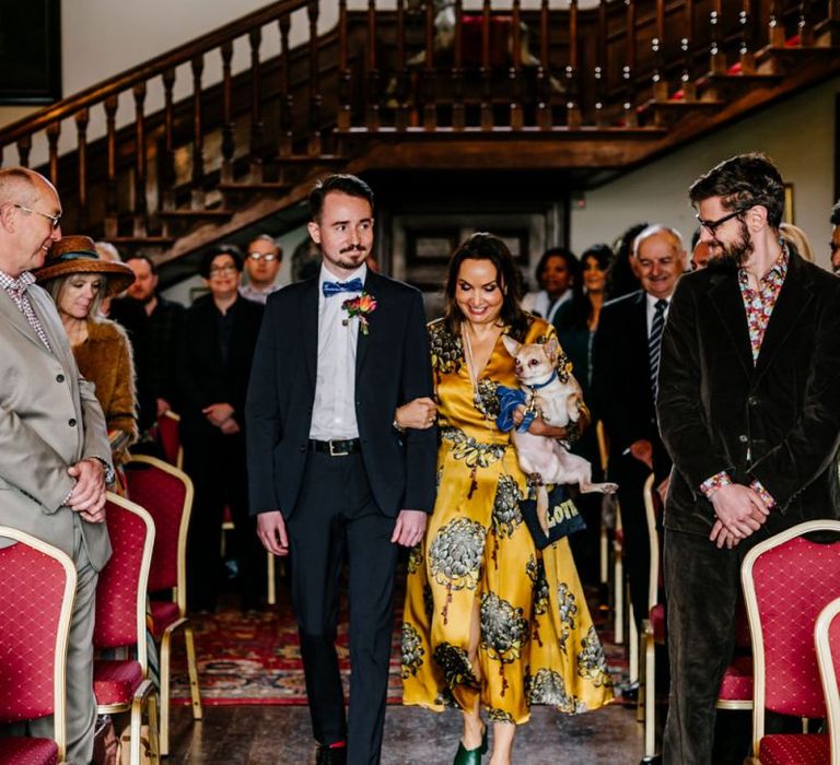 Bridesman and Mother of the Bride Walking down the Aisle