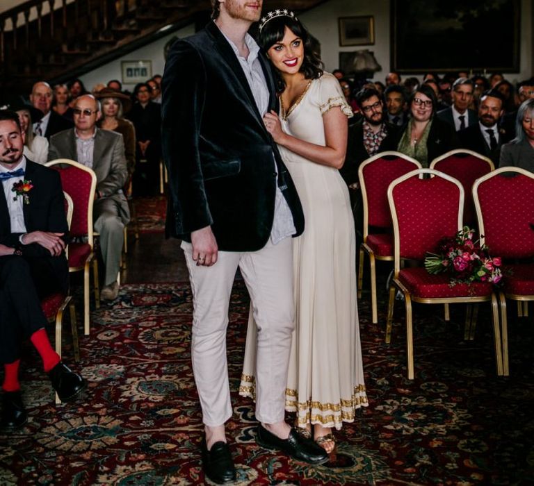 Wedding Ceremony with Stylish Bride in Vintage  Wedding Dress with Gold Trims and Groom in Velvet Blazer