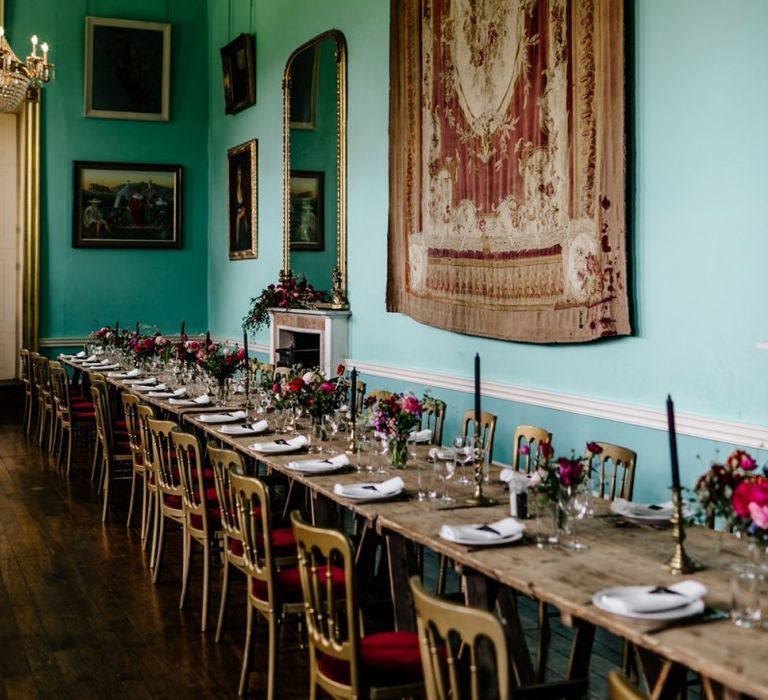 Walcot Hall Wedding Reception with Gold Chairs, Tapestry and Red Flowers