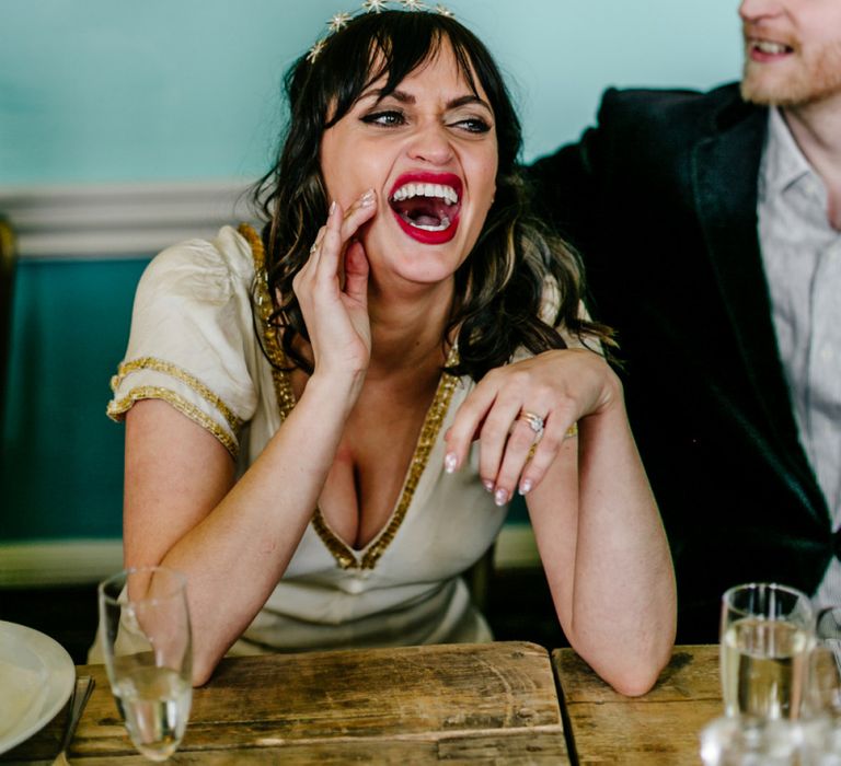 Bride with Red lipstick Laughing During the Wedding Reception Speeches-097