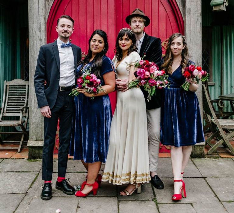 Wedding Party Portrait with Bridesmaids in Velvet Navy Dresses and Red Shoes and Bride in Vintage Wedding Dress-107