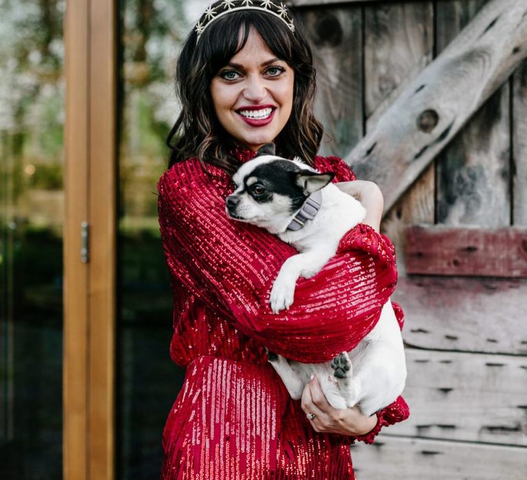 Stylish Bride in Sequin Red Evening Dress Holding Her Pet Dog124