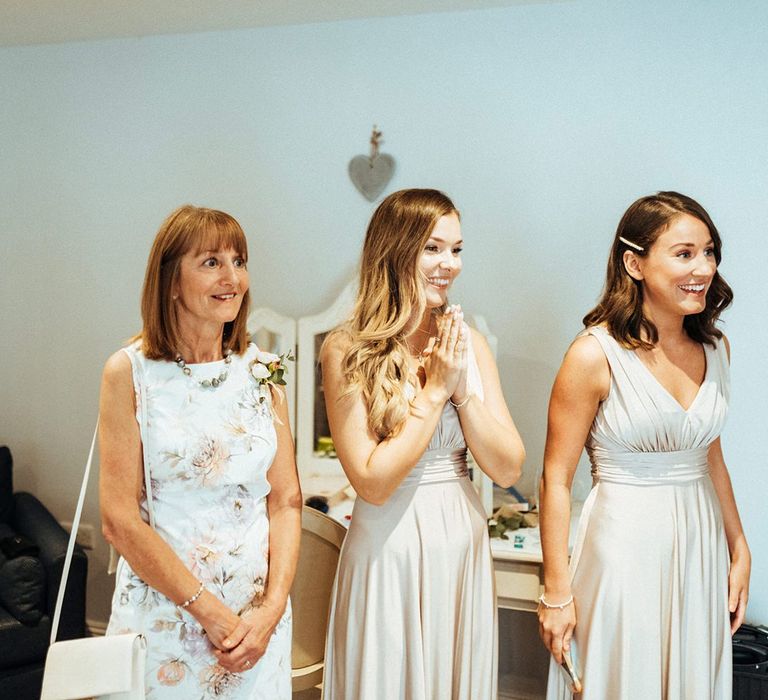 Bridesmaids see bride for the first time