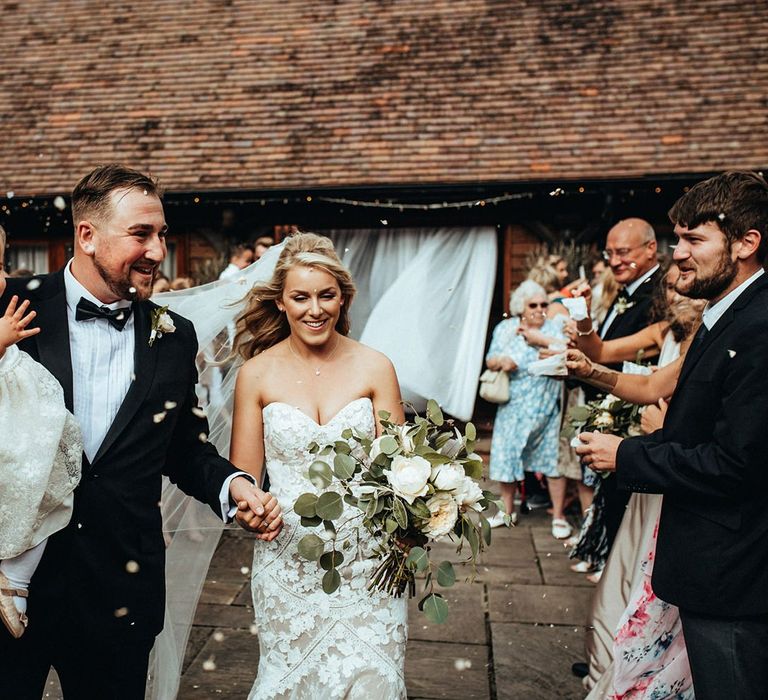 Confetti exit for bride and groom