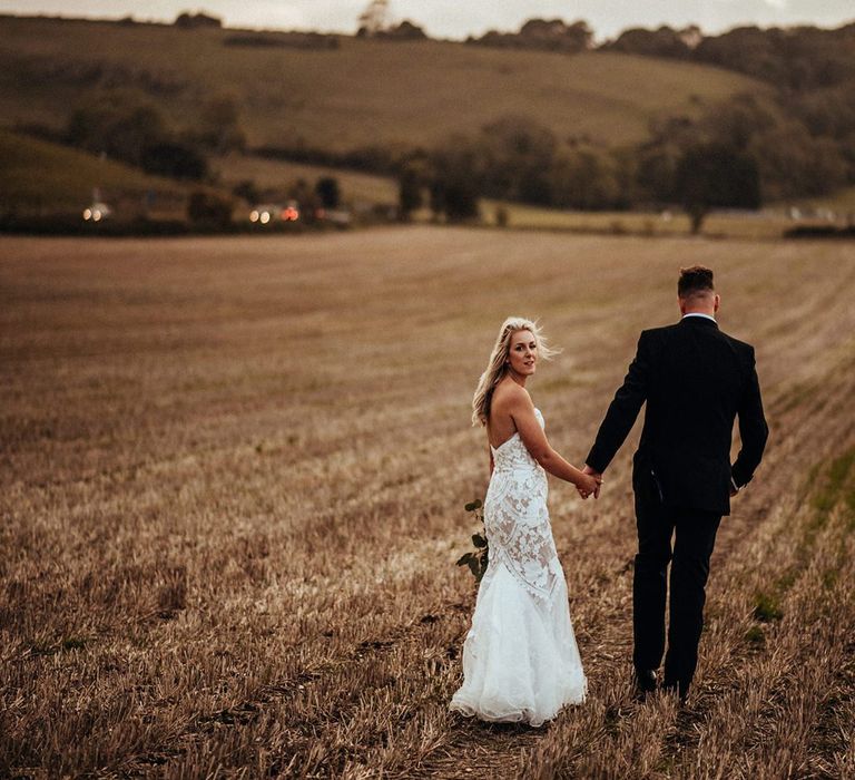 Bride and groom at rustic wedding