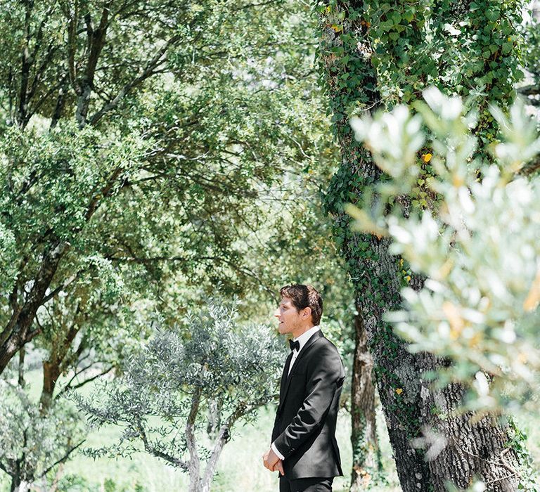 Groom in Black Tie Suit | Outdoor Wedding at Commanderie de Peyrassol, Provence, France Styled by La Chuchoteuse | Lace Bridal Gown | Black Tie Suit | Rustic Stretch Tent Reception | Raisa Zwart Photography