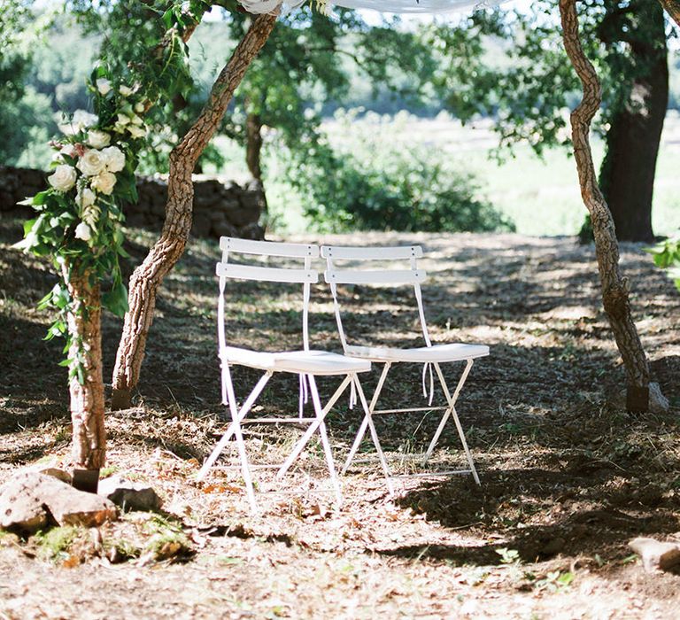 Floral Arch | Outdoor Wedding at Commanderie de Peyrassol, Provence, France Styled by La Chuchoteuse | Lace Bridal Gown | Black Tie Suit | Rustic Stretch Tent Reception | Raisa Zwart Photography