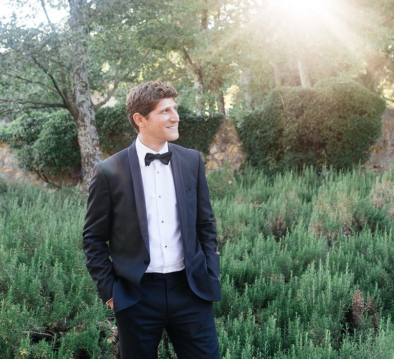 Groom in Tuxedo Suit | Outdoor Wedding at Commanderie de Peyrassol, Provence, France Styled by La Chuchoteuse | Lace Bridal Gown | Black Tie Suit | Rustic Stretch Tent Reception | Raisa Zwart Photography