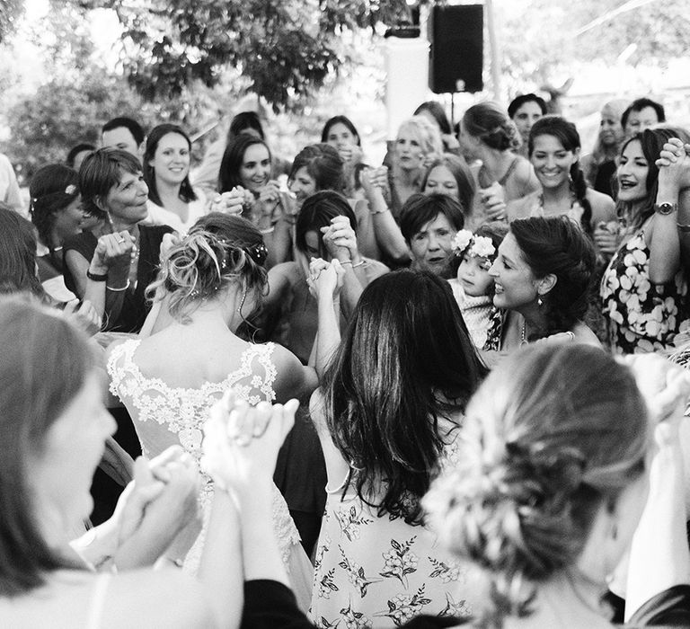 Elegant Bride in Lace Wedding Dress | Groom in Black Tie Suit | Outdoor Wedding at Commanderie de Peyrassol, Provence, France Styled by La Chuchoteuse | Lace Bridal Gown | Black Tie Suit | Rustic Stretch Tent Reception | Raisa Zwart Photography