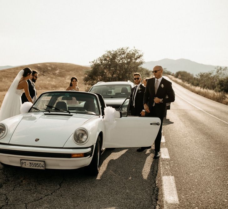 White wedding car at Italian intimate wedding