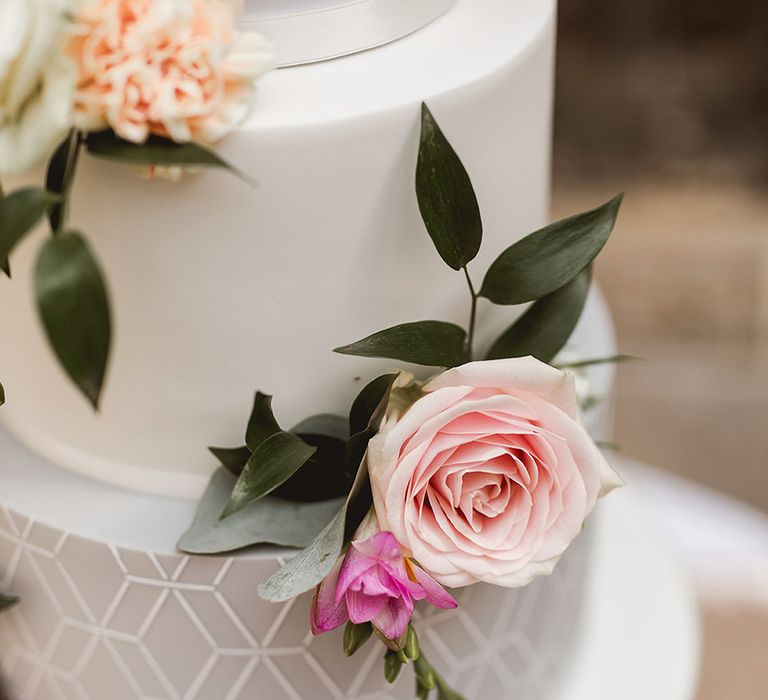 Iced Wedding Cake With Geometric Details // Geometric Details &amp; Hanging Foliage For Hengrave Hall Wedding With Outdoor Reception With Images From Sam And Louise Photography