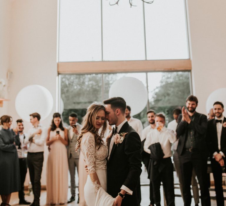 First Dance | Bride in Madison James Bridal Gown | Groom in Tuxedo | Millbridge Court, Surrey Wedding with DIY Decor, Foliage &amp; Giant Balloons | Nataly J Photography