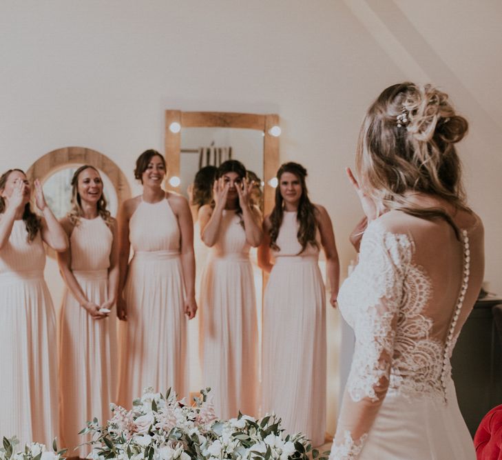 Bridesmaids First Look | Pink Halterneck Pleated Dresses | Bride in Madison James Bridal Gown | Millbridge Court, Surrey Wedding with DIY Decor, Foliage &amp; Giant Balloons | Nataly J Photography