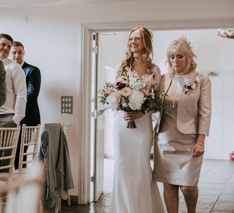 Bridal Entrance with Mother of The Bride | Bride in Madison James Bridal Gown | Millbridge Court, Surrey Wedding with DIY Decor, Foliage &amp; Giant Balloons | Nataly J Photography