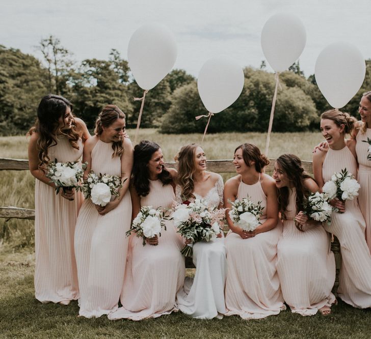 Bridal Party | Bridesmaids in Pink Pleated Dresses | Bride in Madison James Bridal Gown | Millbridge Court, Surrey Wedding with DIY Decor, Foliage &amp; Giant Balloons | Nataly J Photography