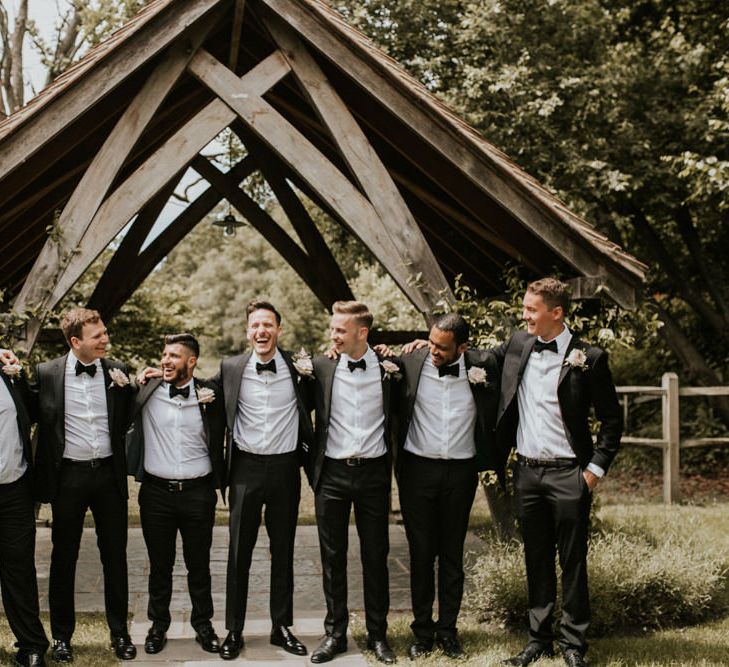 Groomsmen in Black Tuxedos | Millbridge Court, Surrey Wedding with DIY Decor, Foliage &amp; Giant Balloons | Nataly J Photography