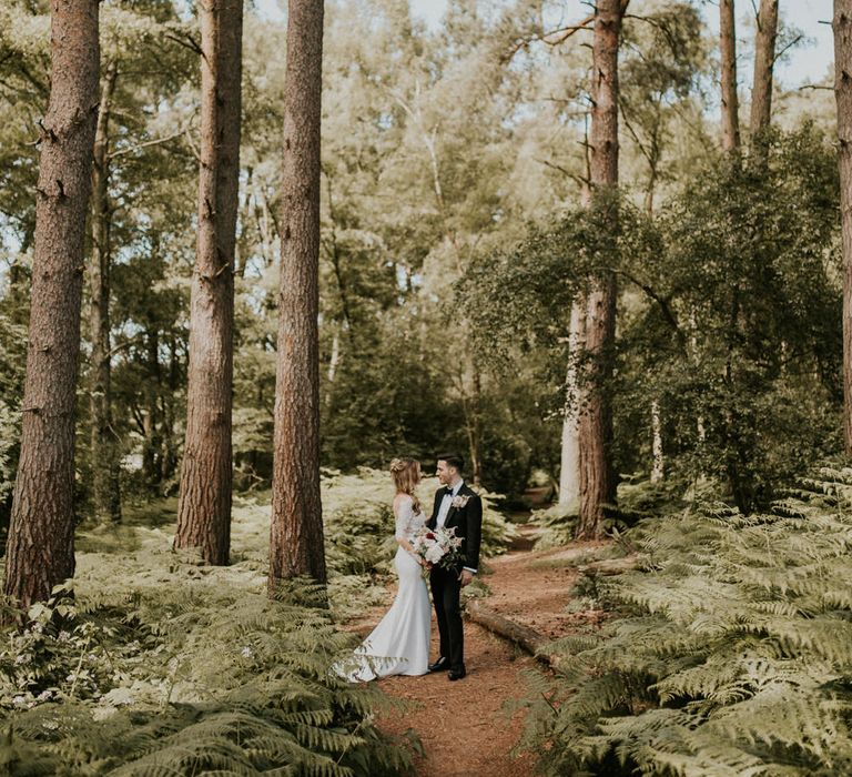 Woodland Portrait | Bride in Madison James Bridal Gown | Groom in Tuxedo | Millbridge Court, Surrey Wedding with DIY Decor, Foliage &amp; Giant Balloons | Nataly J Photography