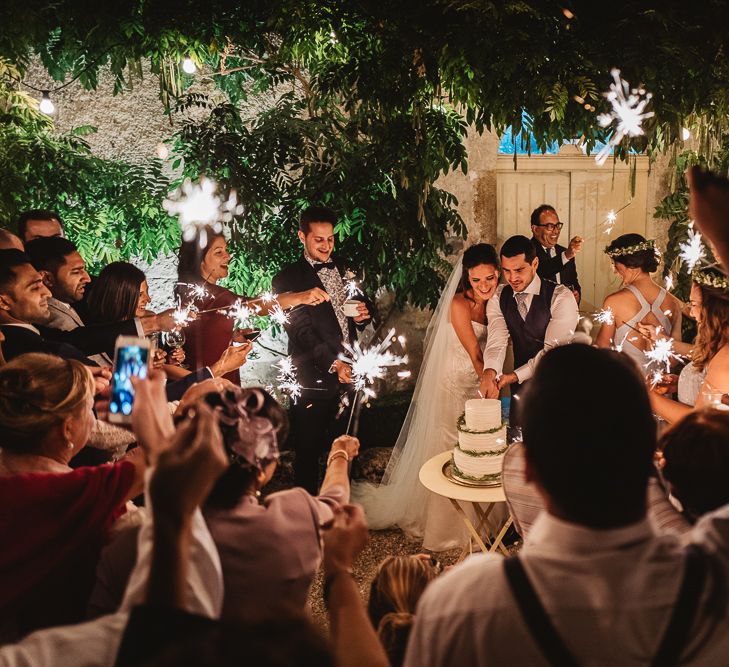 Cake Cutting And Sparklers // French Destination Wedding Bordeaux  Marry Me In France Suzanne Neville Bride Darek Smietana Photography