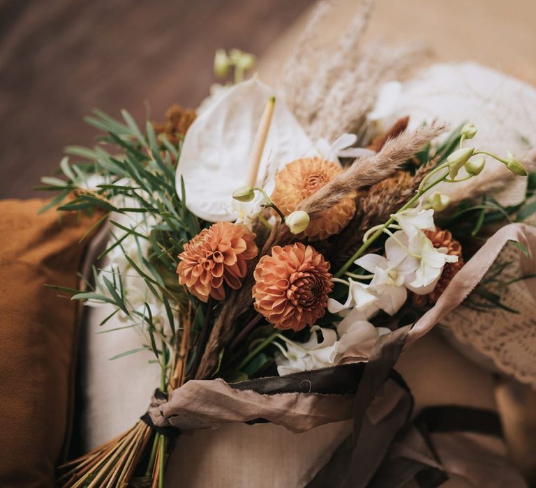 Boho Wedding Bouquet with Pompom Dahlias, white Anthurium's, Pampas Grass and Orchids