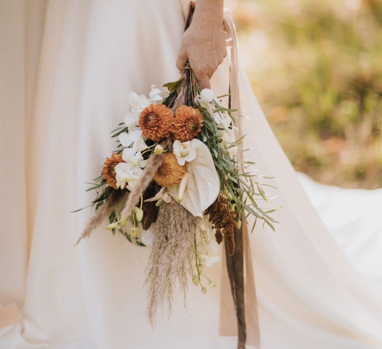 Bride Holding a Boho Wedding Bouquet