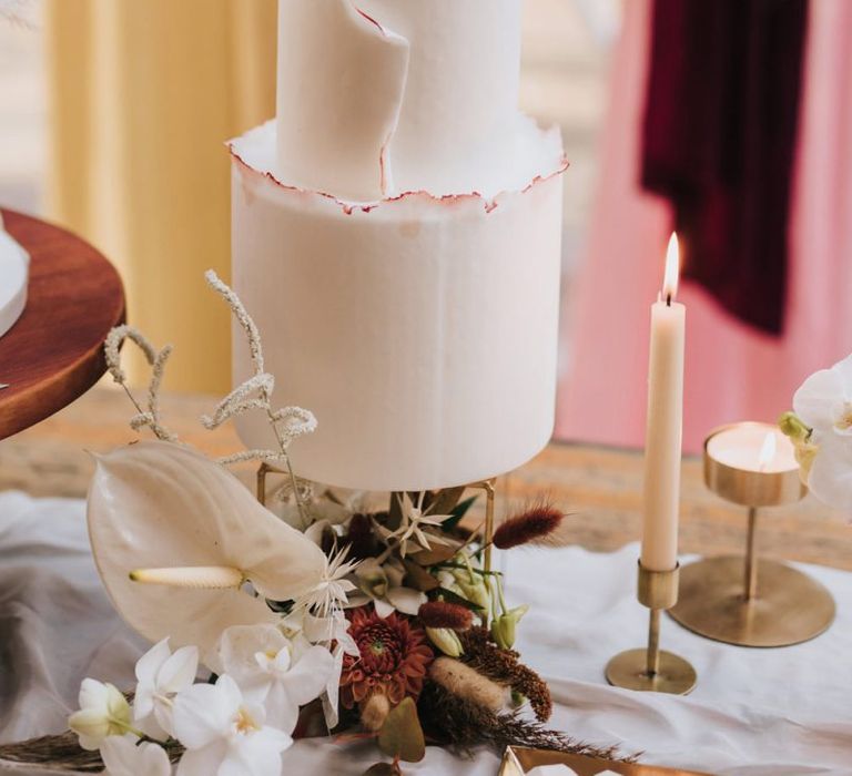 Elegant Two Tier Iced Wedding Cake with Rough Edge Detail