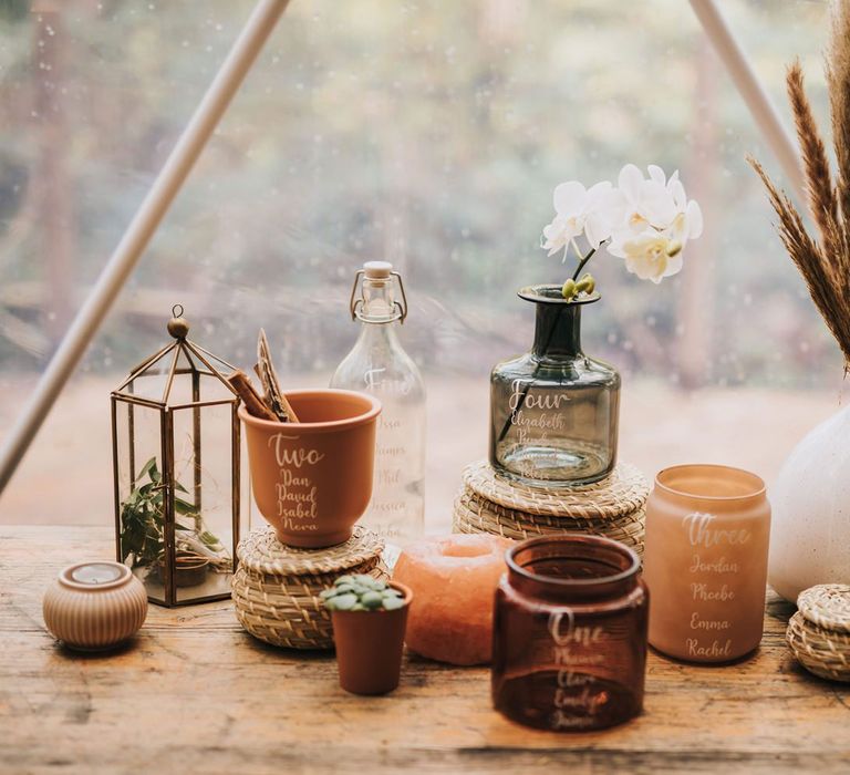 Boho Table Plan Witten on Ink Wells, Terracotta Pots &amp; Votives in Geometric Dome