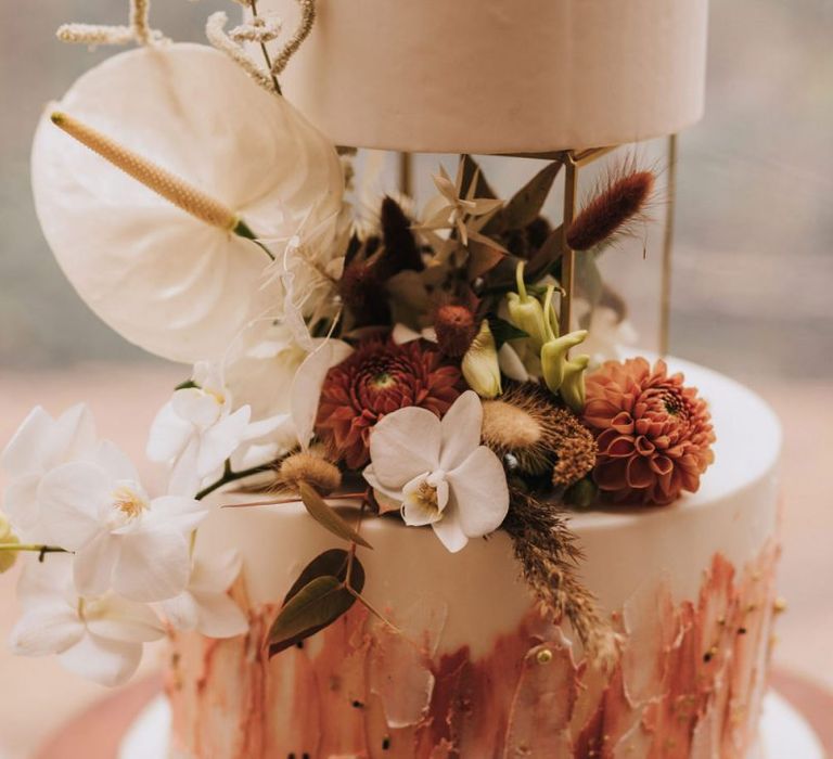 White Anthurium's and Pompom Dahlia Wedding Cake Decor