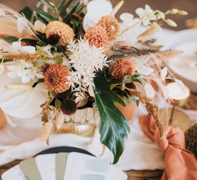 Flower Centrepiece with Pompom Dahlias, white Anthurium's and Dried Grasses