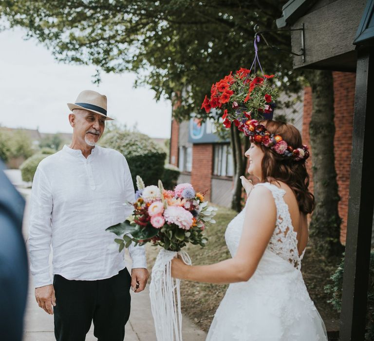 Father of the Bride First Look with Bride in Lace Wedding Dress and Colourful Flower Crown