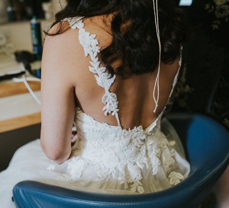 Bride Getting Ready in Lace Wedding with Straps