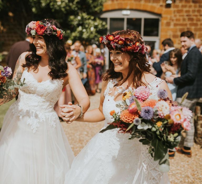 Same Sex Wedding Confetti Moment with Two Brides in Lace Wedding Dress