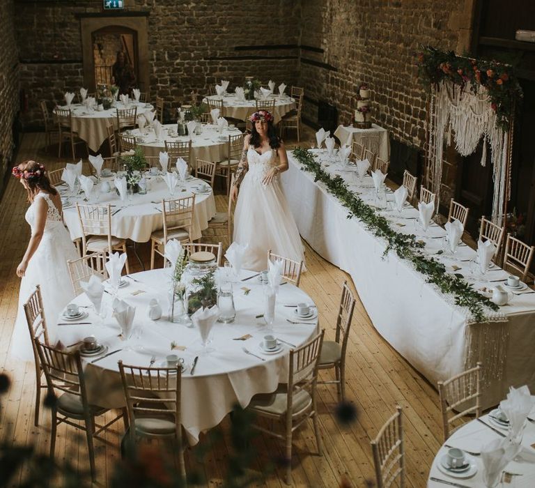 Reception at The Barns at Hunsbury Hill in Northamptonshire with Festoon Lights and Macrame Top Table Backdrop