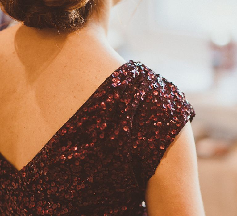 Coast Sequin Burgundy Top | Burgundy &amp; Gold Winter Wedding at Ramster Hall Weddings, Surrey | Matt Penberthy Photography | John Harris Wedding Films