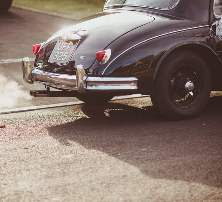 Wedding Car | Burgundy &amp; Gold Winter Wedding at Ramster Hall Weddings, Surrey | Matt Penberthy Photography | John Harris Wedding Films