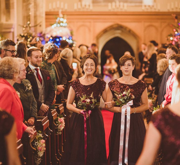 Church Wedding Ceremony | Bridesmaid Entrance in Coast Separates | Burgundy &amp; Gold Winter Wedding at Ramster Hall Weddings, Surrey | Matt Penberthy Photography | John Harris Wedding Films