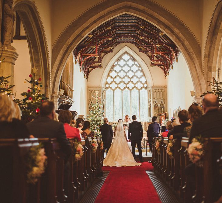 Church Wedding Ceremony | Bride in Lillian West Bridal Separates | Groom in Navy Suit &amp; Tweed Waistcoat | Burgundy &amp; Gold Winter Wedding at Ramster Hall Weddings, Surrey | Matt Penberthy Photography | John Harris Wedding Films