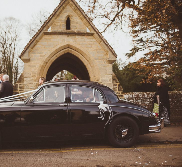 Wedding Car | Burgundy &amp; Gold Winter Wedding at Ramster Hall Weddings, Surrey | Matt Penberthy Photography | John Harris Wedding Films