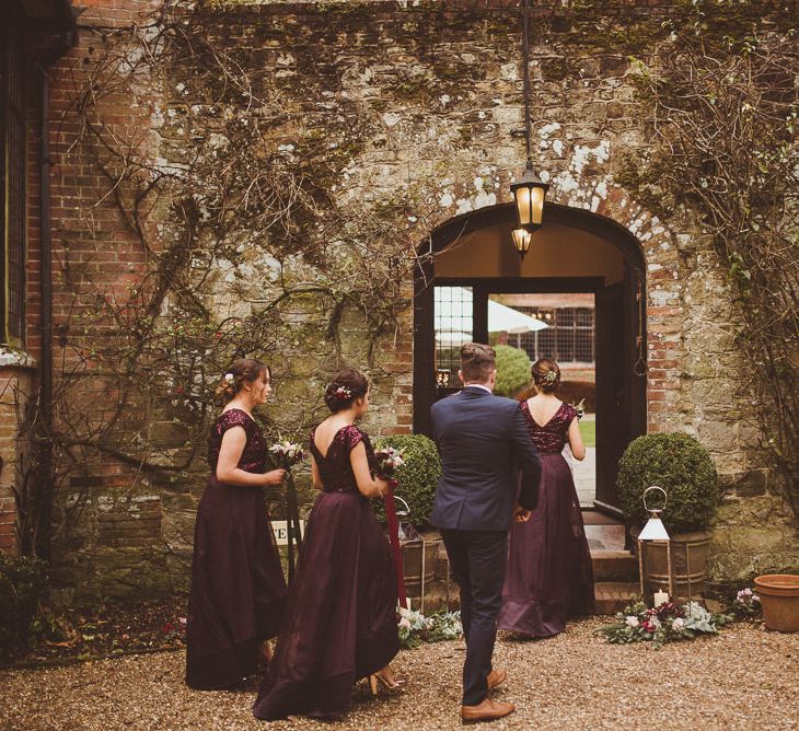 Bridesmaids in Burgundy Coast Sequin Top &amp; High Low Skirt Separates | Burgundy &amp; Gold Winter Wedding at Ramster Hall Weddings, Surrey | Matt Penberthy Photography | John Harris Wedding Films