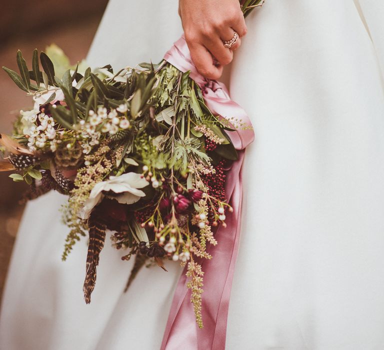 Winter Wedding Bouquet with Ribbons | Burgundy &amp; Gold Winter Wedding at Ramster Hall Weddings, Surrey | Matt Penberthy Photography | John Harris Wedding Films