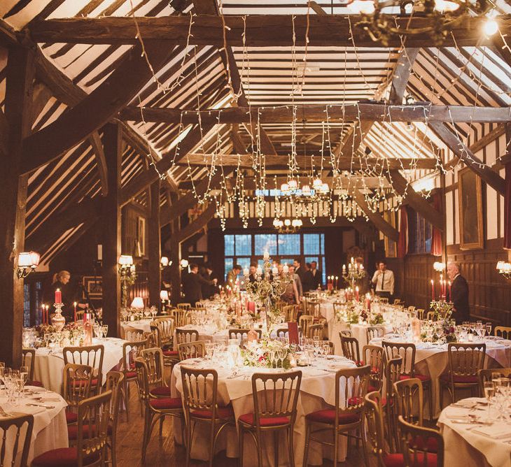 String Lights Fairy Light Canopy | Burgundy &amp; Gold Winter Wedding at Ramster Hall Weddings, Surrey | Matt Penberthy Photography | John Harris Wedding Films