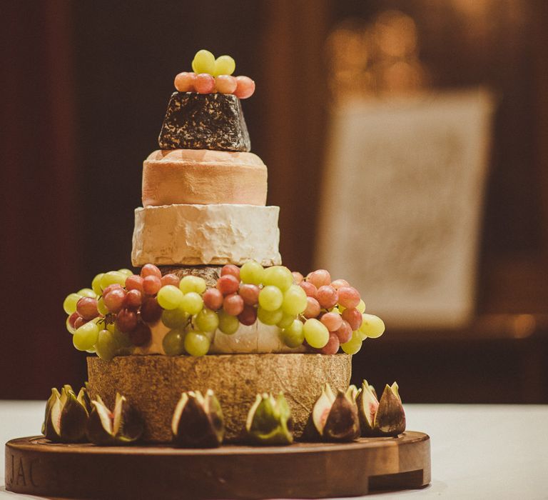 Cheese Tower Wedding Cake | Burgundy &amp; Gold Winter Wedding at Ramster Hall Weddings, Surrey | Matt Penberthy Photography | John Harris Wedding Films