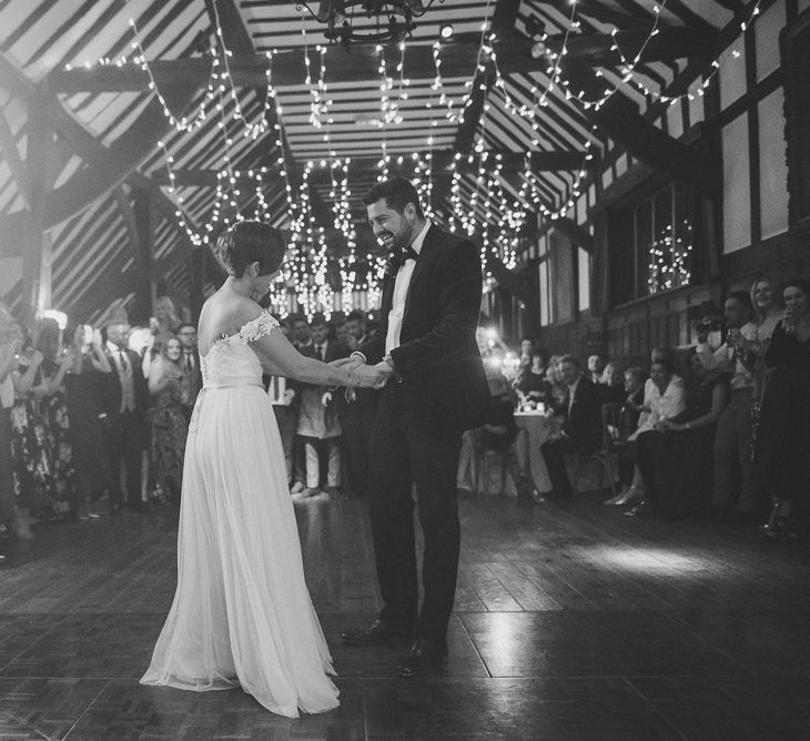 First Dance | Bride in Lillian West Bridal Separates | Groom in Navy Suit with Tweed Waistcoat | Burgundy &amp; Gold Winter Wedding at Ramster Hall Weddings, Surrey | Matt Penberthy Photography | John Harris Wedding Films