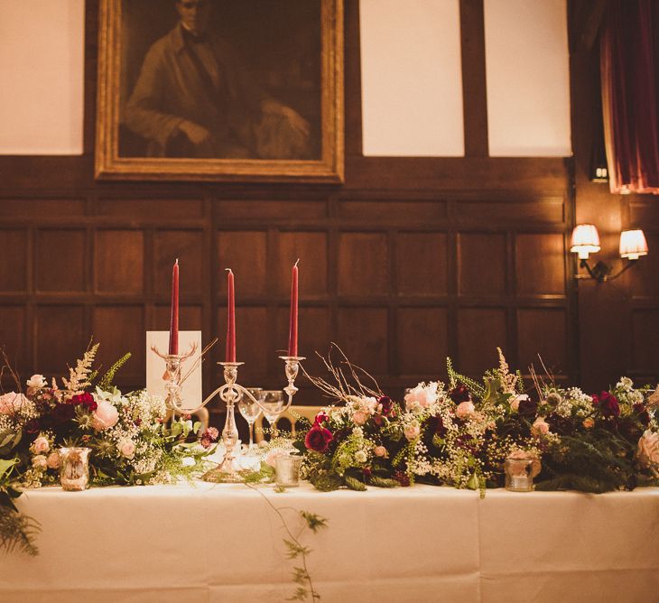 Top Table Wedding Decor | Burgundy &amp; Gold Winter Wedding at Ramster Hall Weddings, Surrey | Matt Penberthy Photography | John Harris Wedding Films