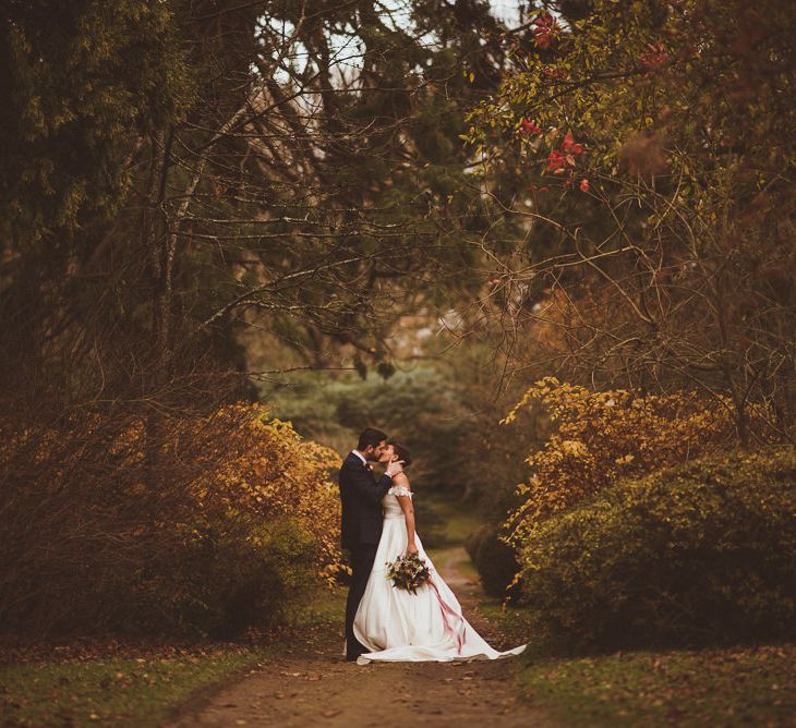 Bride in Lillian West Bridal Separates | Groom in Navy Suit &amp; Tweed Waistcoat | Burgundy &amp; Gold Winter Wedding at Ramster Hall Weddings, Surrey | Matt Penberthy Photography | John Harris Wedding Films