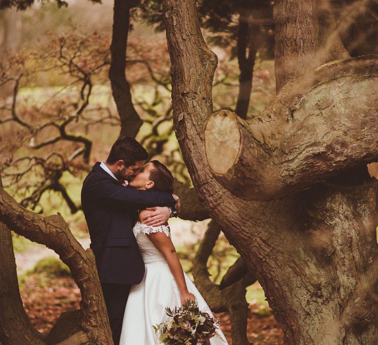 Bride in Lillian West Bridal Separates | Groom in Navy Suit &amp; Tweed Waistcoat | Burgundy &amp; Gold Winter Wedding at Ramster Hall Weddings, Surrey | Matt Penberthy Photography | John Harris Wedding Films