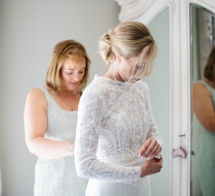 Papakata Sperry Tent Wedding at family home | Sassi Holford Dress with added ivory Ostrich feathers to veil | Manolo Blahnik shoes | Images by Melissa Beattie