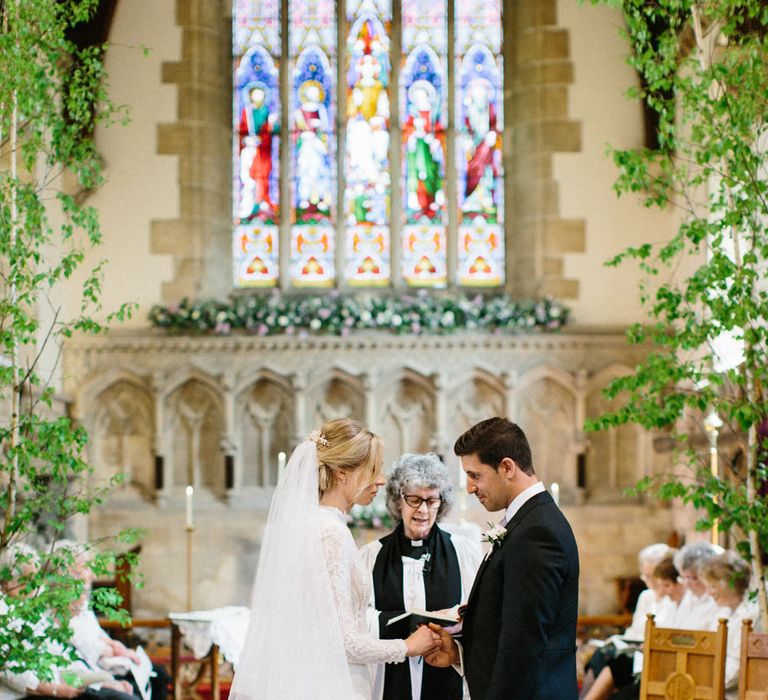 Lilac and white floral aisle runner | Silver Birch trees | Papakata Sperry Tent Wedding at family home | Sassi Holford Dress with added ivory Ostrich feathers to veil | Manolo Blahnik shoes | Images by Melissa Beattie